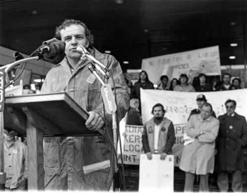 October 14th, 1976 -- Labour Council President, George Vair, speaks in front of City Hall. Standing to the right is Larry Hanley, the protest coordinator, Donald Montgomery Sec-treas. of the Canadian Labour Congress and Paul LePage, President of the New Brunswick Federation of Labour.
