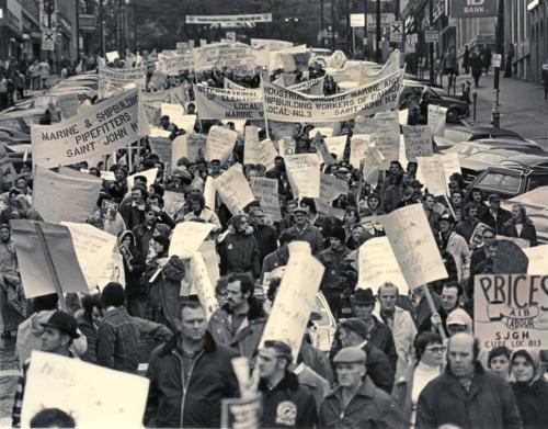 October 14th, 1976 -- Protesters proceed down King Street, on their way to City Hall where they heard hard-hitting speeches condemning the federal government's wage control program.